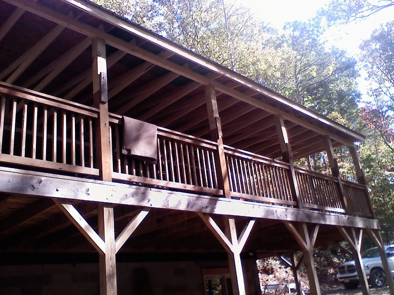 Timber framing under a new elevated porch and deck — Roof Leak Repair in Haskins by Roofing Brothers